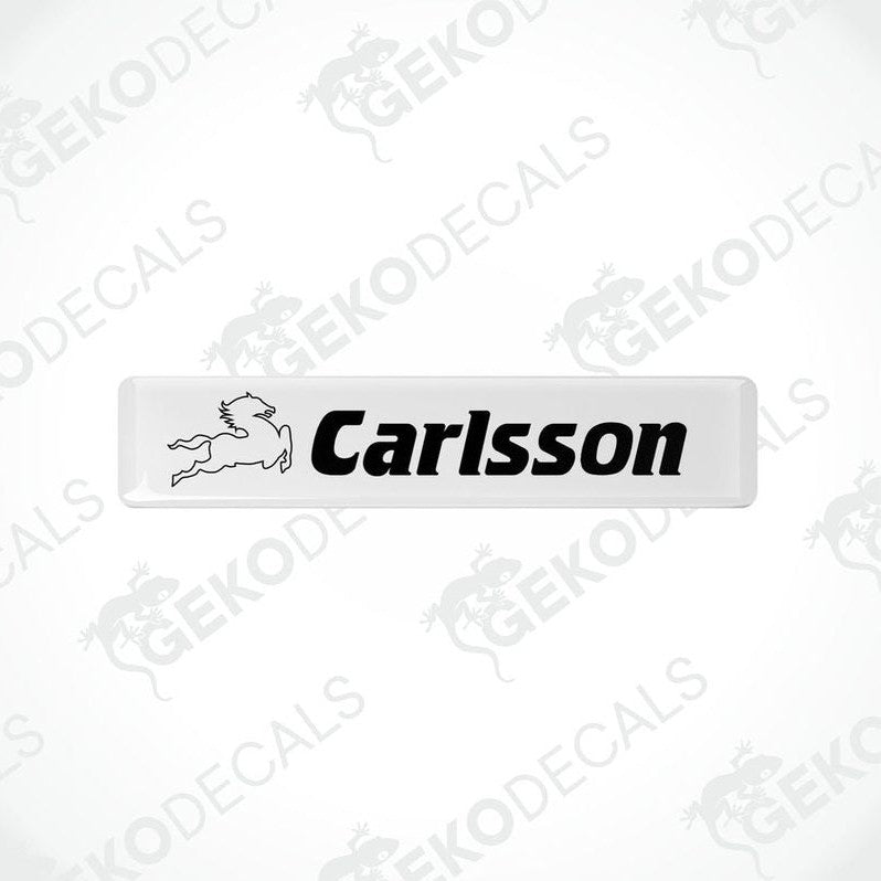 White vinyl decals with the text 'Carlsson' and a logo on them.