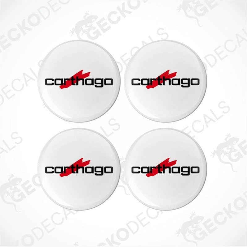 A set of four white vinyl stickers with the red and black logo of CARTHAGO printed on them.