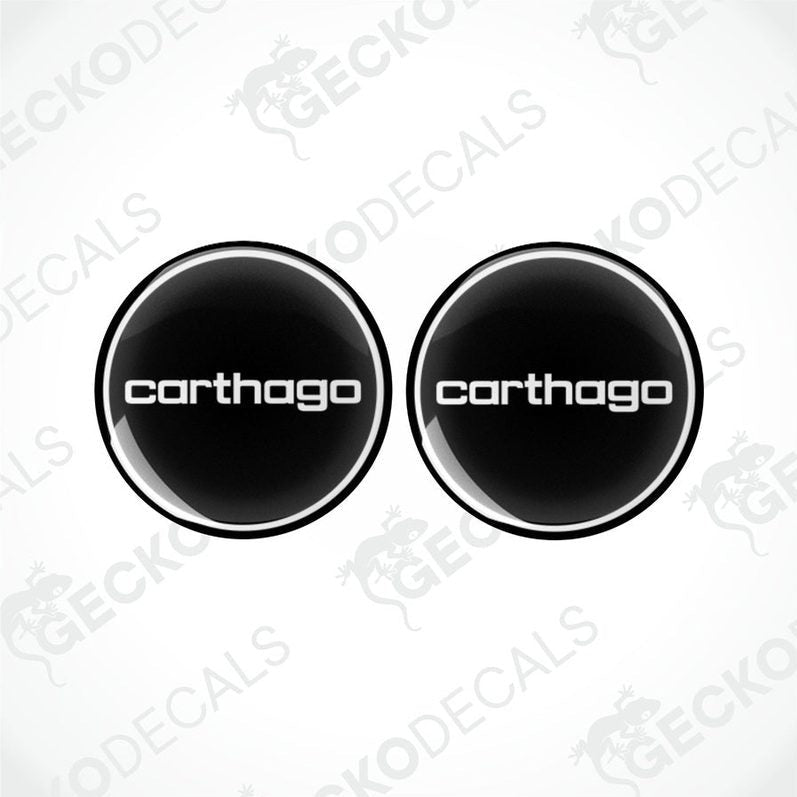 Two round black vinyl stickers with the word 'CARTHAGO' written in white. Gecko Decals logo is visible in the corner.