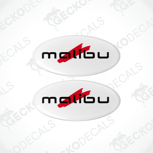 Two white oval-shaped epoxy decals with the text 'malibu' and a red arrow on them.