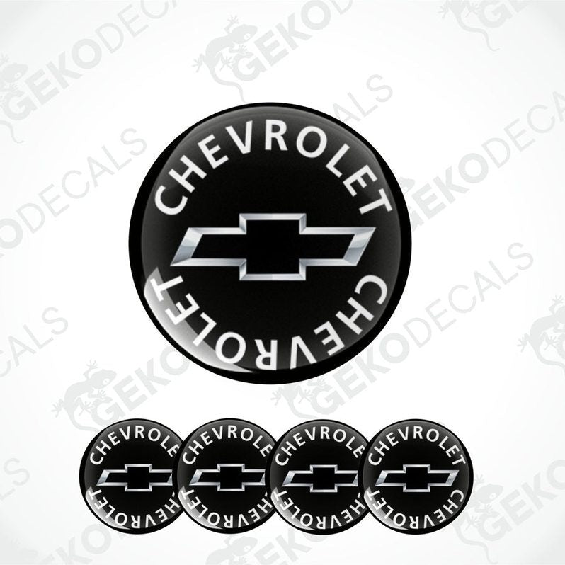 A set of four black vinyl stickers with the word 'CHEVROLET' and the Chevrolet logo on each.