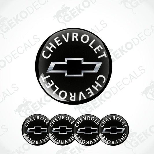 A set of four black vinyl stickers with the word 'CHEVROLET' and the Chevrolet logo on each.