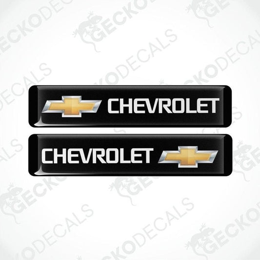 Two black vinyl decals with the Chevrolet logo in yellow.
