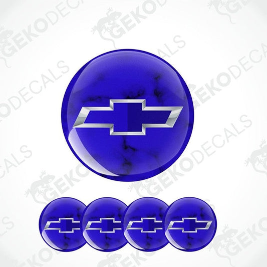 A set of four blue vinyl stickers with a Chevrolet logo, designed for use on car wheels or caps.