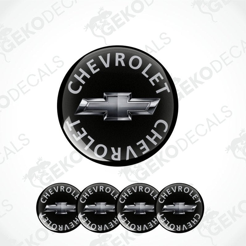 A set of four black vinyl stickers with the word 'CHEVROLET' and the Chevrolet logo on them.