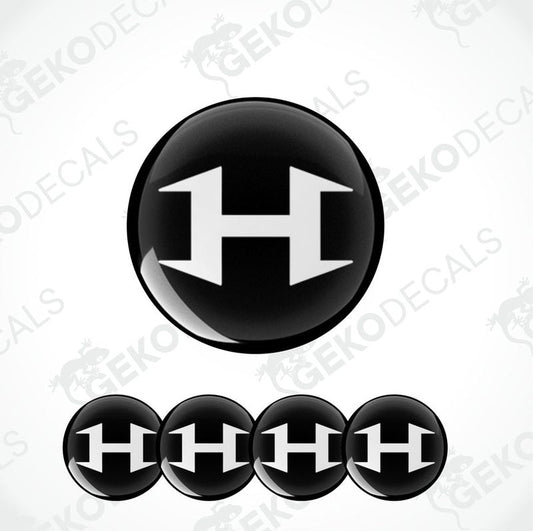 A set of four black vinyl stickers with the word 'HENNESSEY' designed in a specific font and arranged in a spiral pattern.