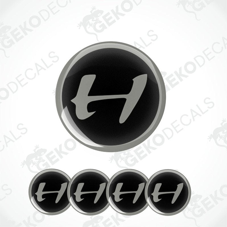 A set of four black vinyl stickers with the word 'HENNESSEY' designed in a specific font and arranged in a spiral pattern.