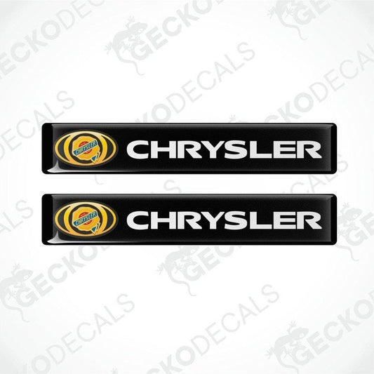 Two black vinyl decals with the Chrysler logo in yellow and white.