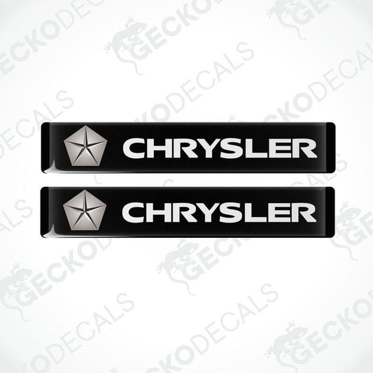 Two black vinyl stickers with the word 'CHRYSLER' and a star symbol logo on a white background.