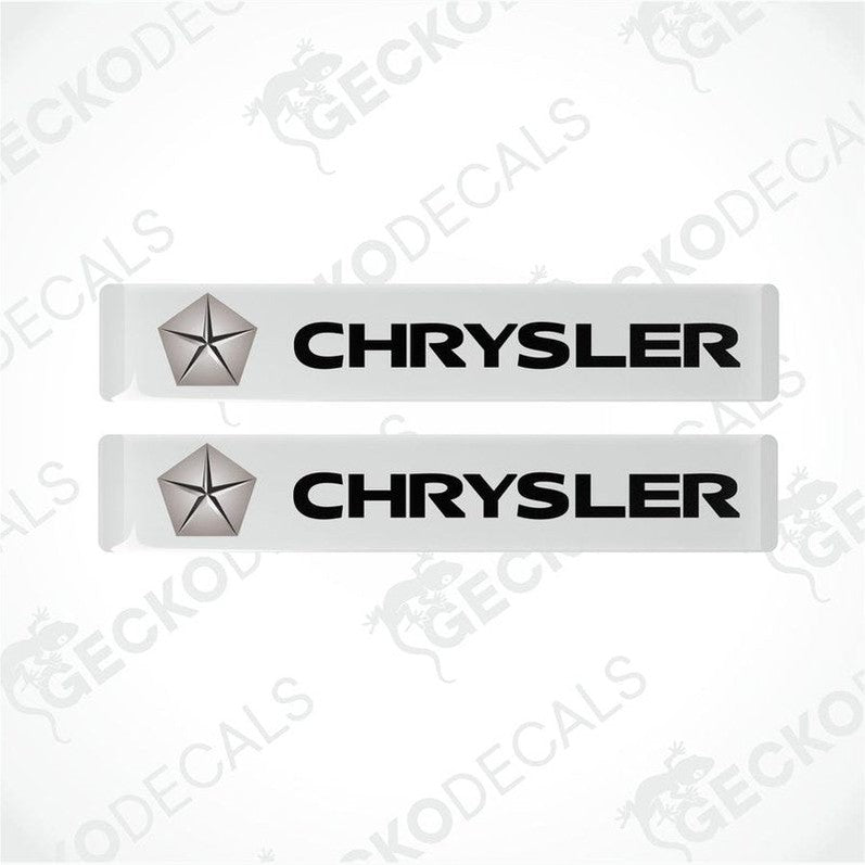 Two white vinyl stickers featuring the word "CHRYSLER" and a star-shaped logo in black on a white background.
