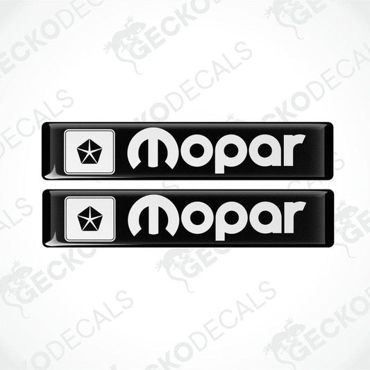 Two black rectangular polyurethane-coated vinyl stickers with a white background with the MOPAR logo and text