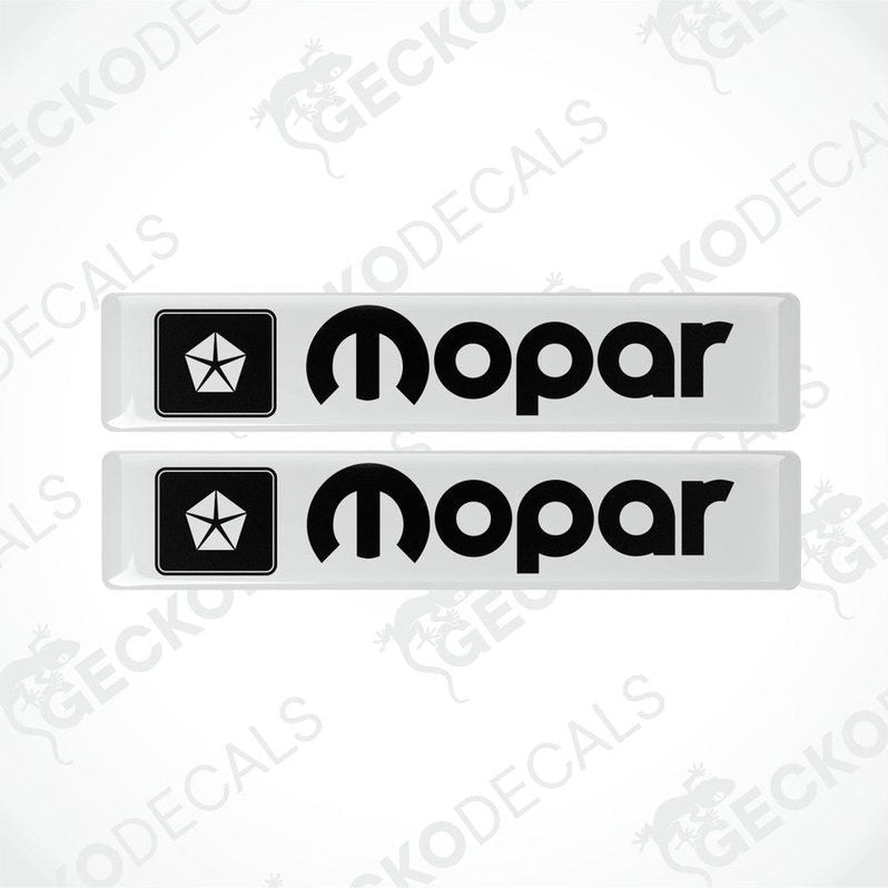 Two black rectangular polyurethane-coated vinyl stickers with a black background with the MOPAR logo and text
