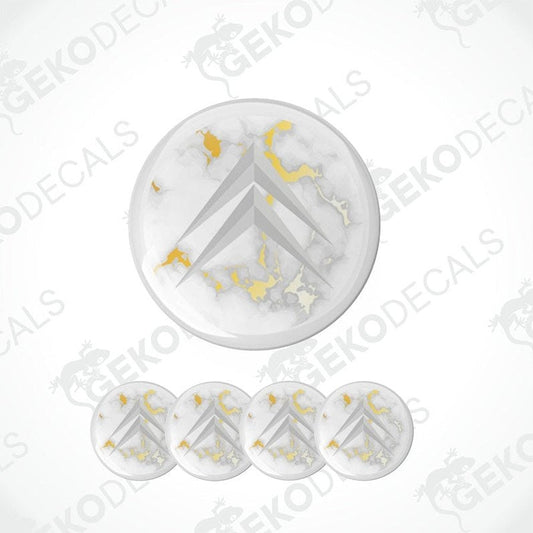 Four dome-shaped stickers with the Citroen logo in white and gold