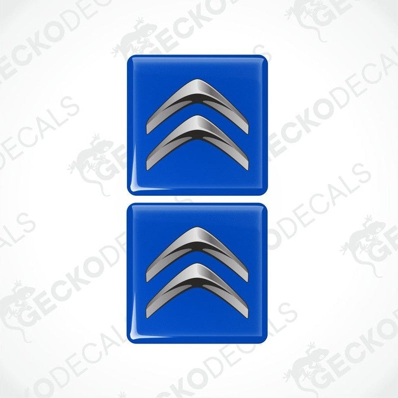 Two blue vinyl decals with a silver chevron design.