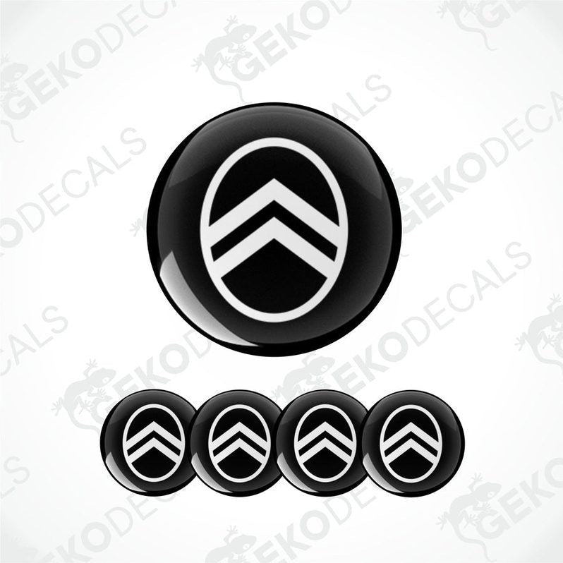 A set of four black and white geometric patterned Citroen logo vinyl stickers.