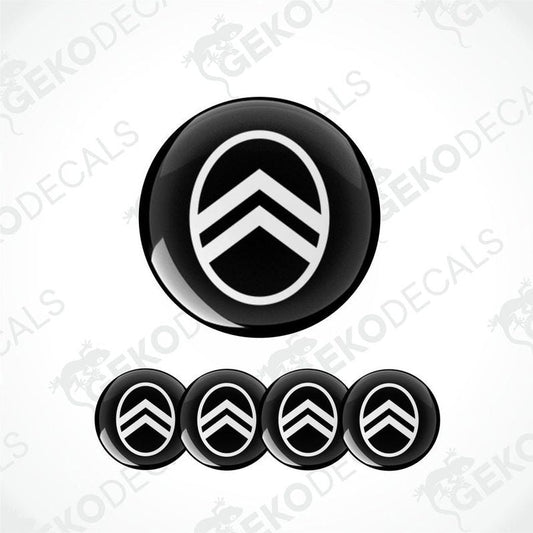 A set of four black and white geometric patterned Citroen logo vinyl stickers.