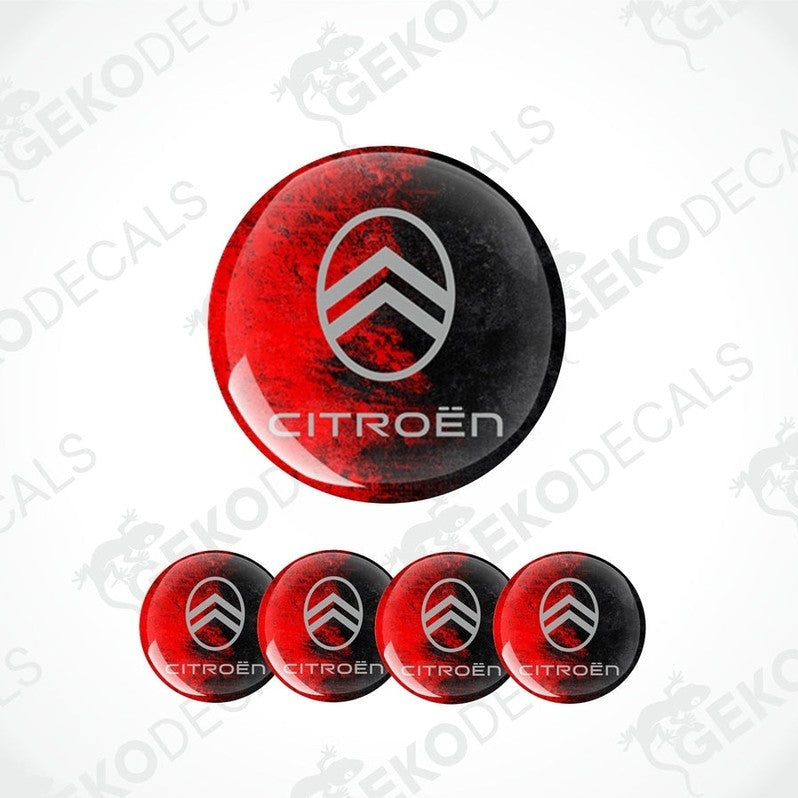 A set of four red and black vinyl stickers with the CITROEN brand logo on them.