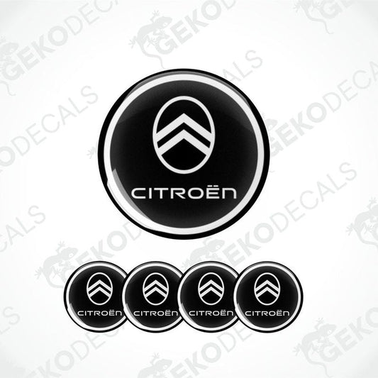 A set of four black and white vinyl stickers with the CITROEN brand logo.