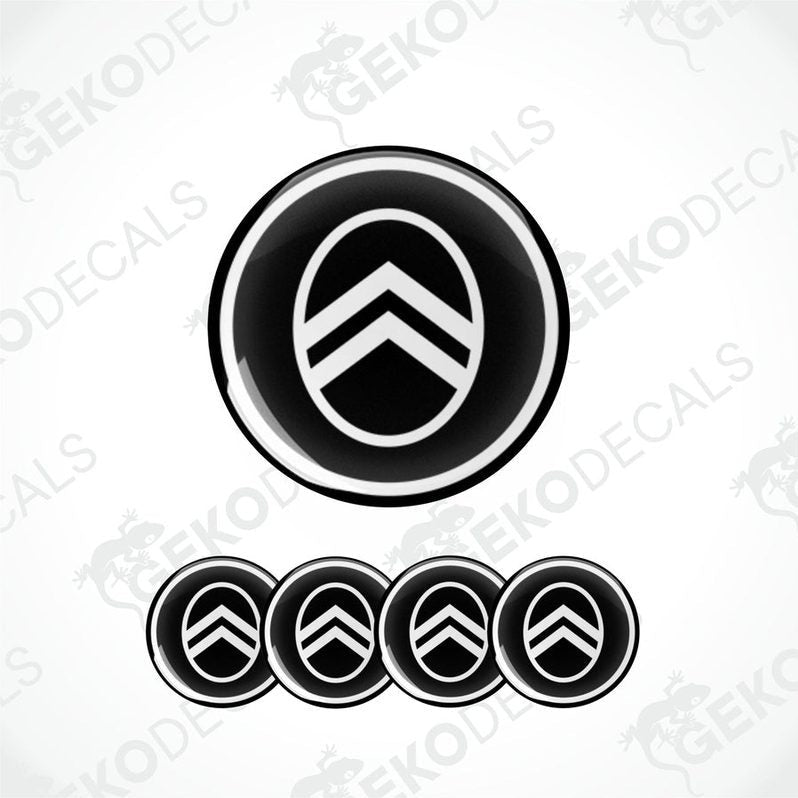 A set of four black and white vinyl stickers with the CITROEN brand logo.