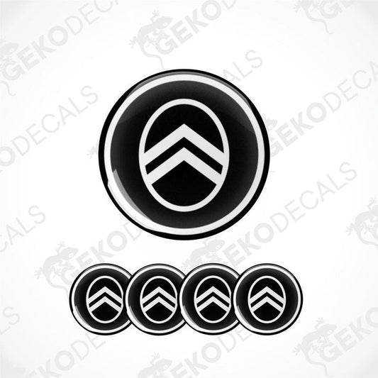 A set of four black and white vinyl stickers with the CITROEN brand logo.