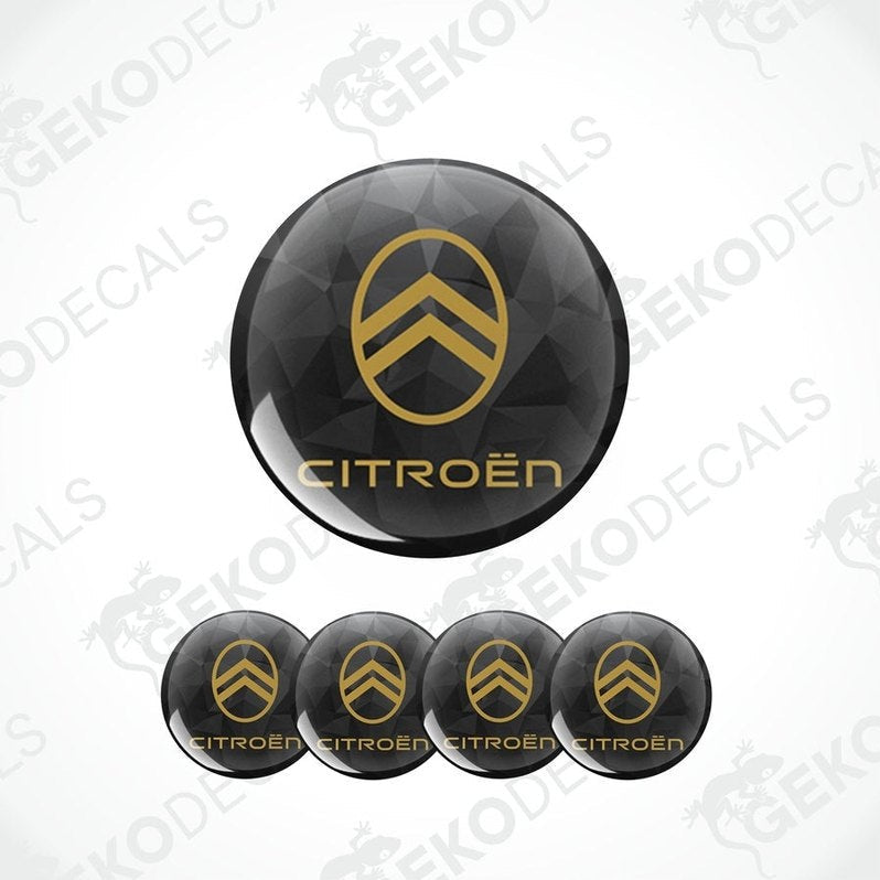 A set of four black vinyl stickers with gold CITROEN branding designed for car decals.
