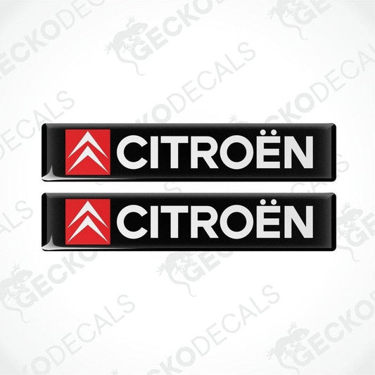 Two rectangular black, red, and white car decals with the CITROEN brand logo