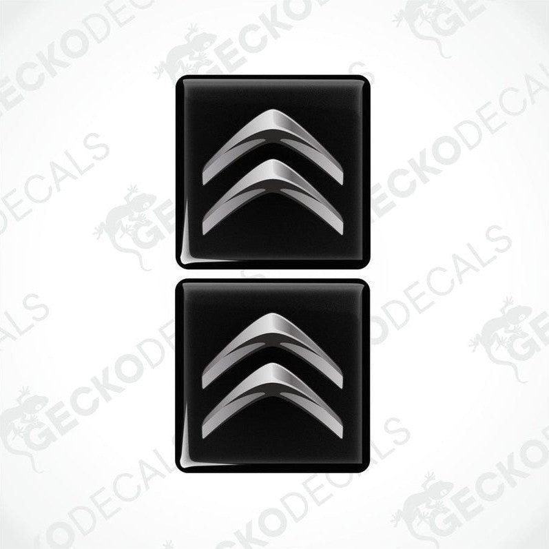 Two black vinyl decals with a silver chevron design.