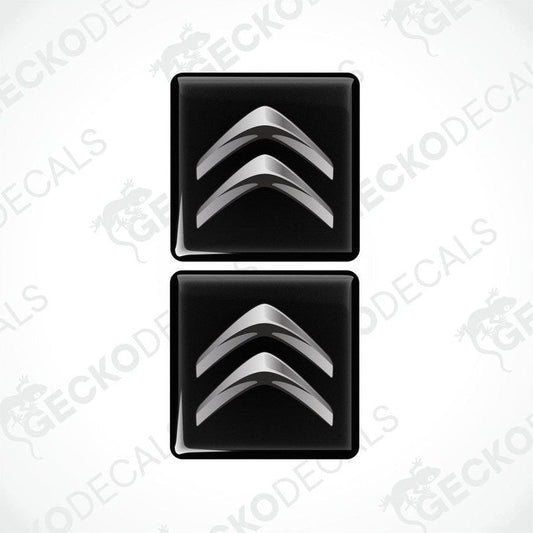 Two black vinyl decals with a silver chevron design.