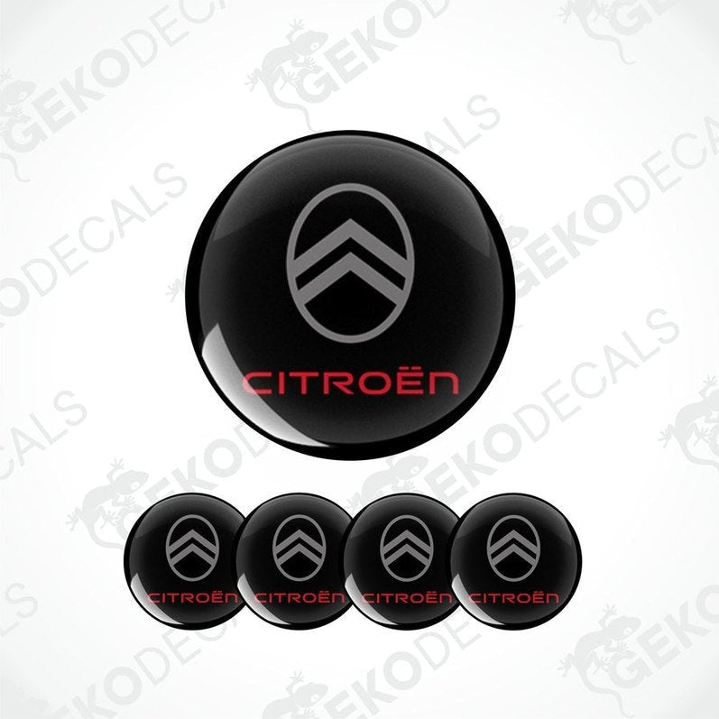 A set of black vinyl decals with the CITROEN logo, intended for use as car wheel caps.