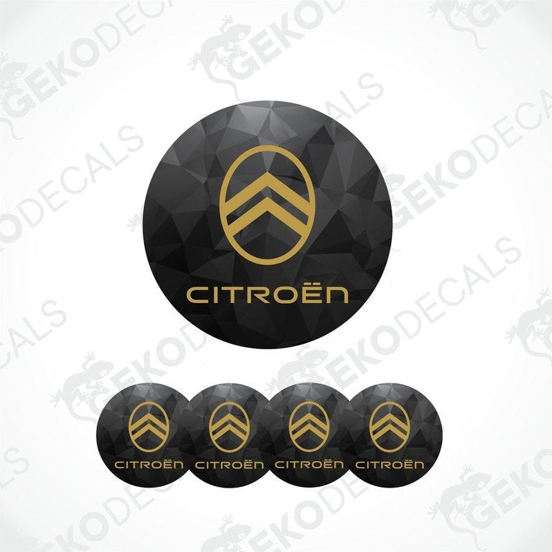 A set of four black vinyl stickers with gold CITROEN branding designed for car decals.