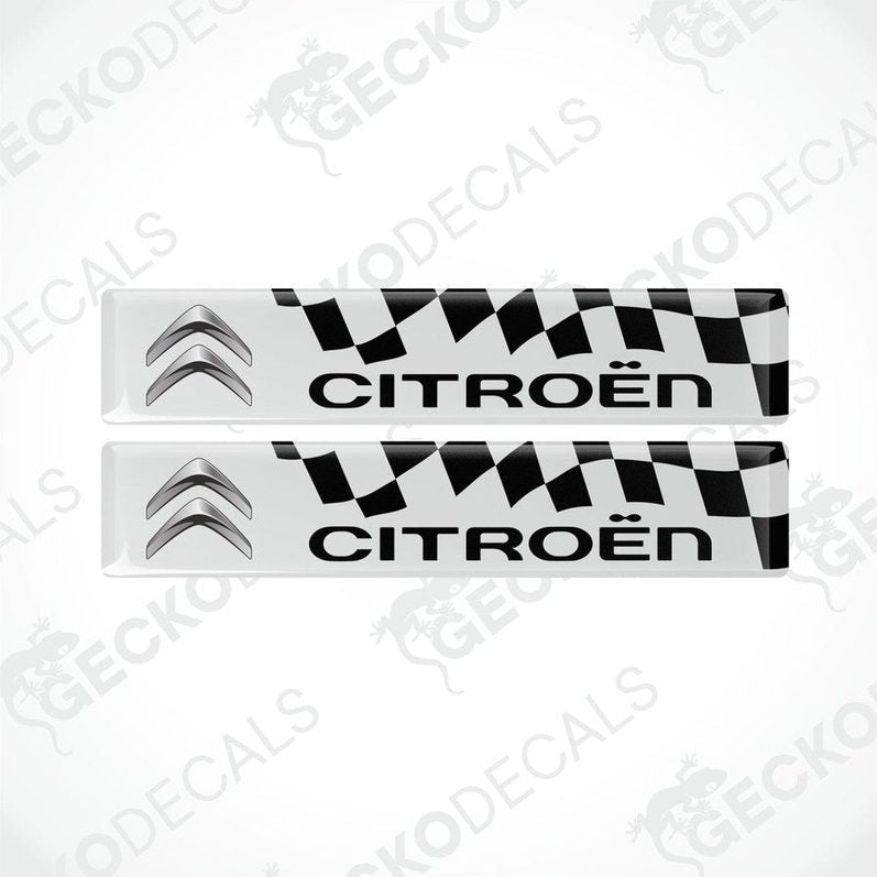 Two white, black, and red vinyl stickers with the CITROEN brand logo.