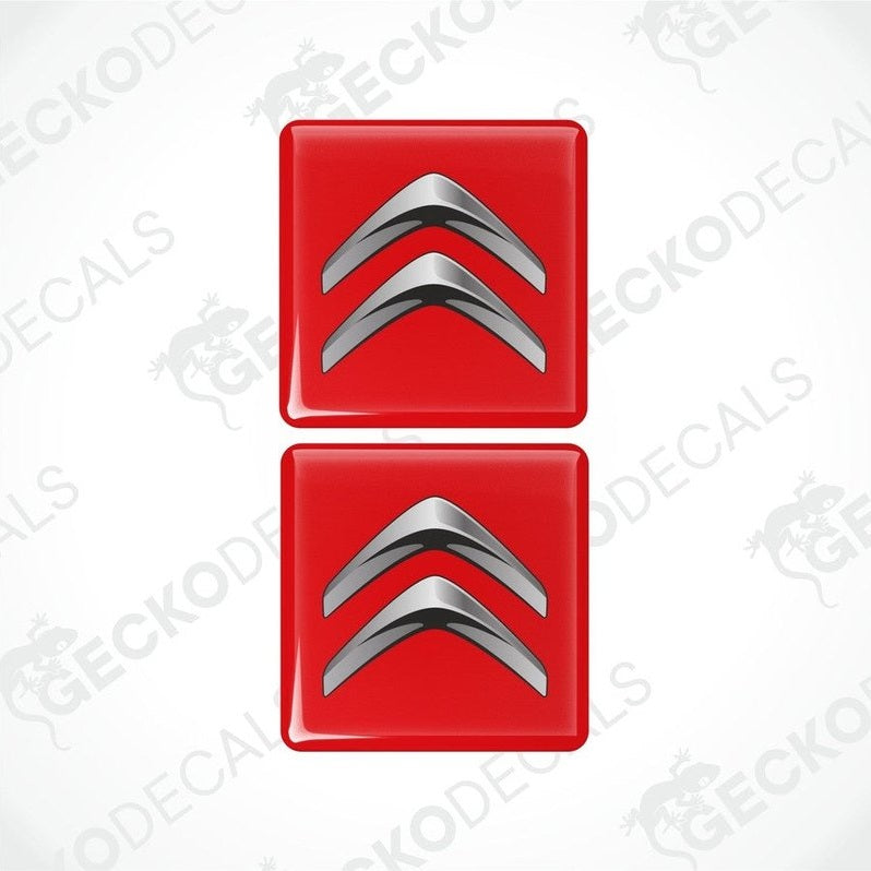 Two red vinyl decals with a silver chevron design.
