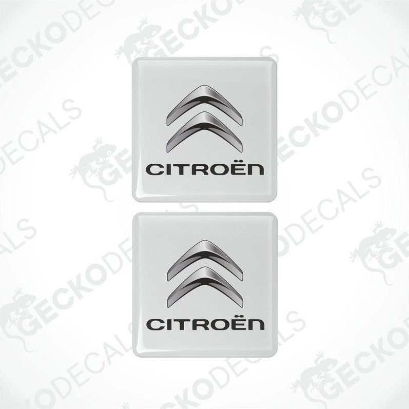Two white and silver vinyl decals with the CITROEN logo.