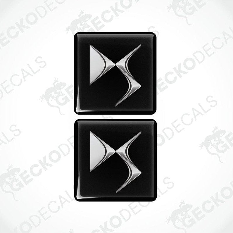 Two black and silver car decals with a geometric pattern design.
