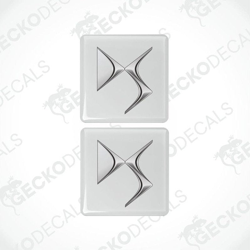 Two white and silver car decals with a geometric pattern design.
