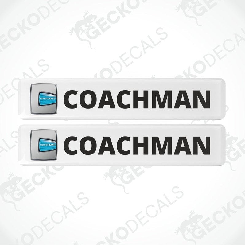 Two white vinyl stickers with the word 'COACHMAN' and a logo depicting a shield and a letter 'C' in the center, placed against a white background with a Gecko Decals watermark.