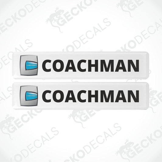 Two white vinyl stickers with the word 'COACHMAN' and a logo depicting a shield and a letter 'C' in the center, placed against a white background with a Gecko Decals watermark.