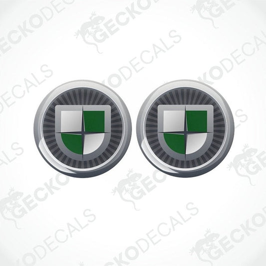 A set of two round vinyl decals with a geometric pattern and a green and silver color scheme, featuring the word 'GECKODECALS'.