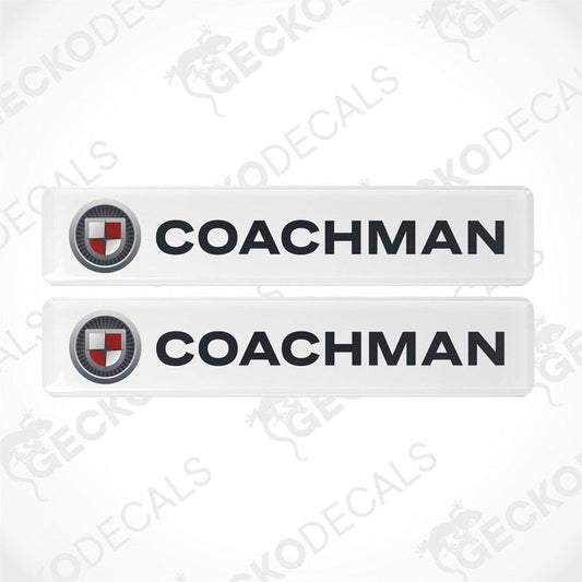 Two white vinyl stickers with the word 'COACHMAN' and a logo depicting a shield and a letter 'C' in the center, placed against a white background with a Gecko Decals watermark.
