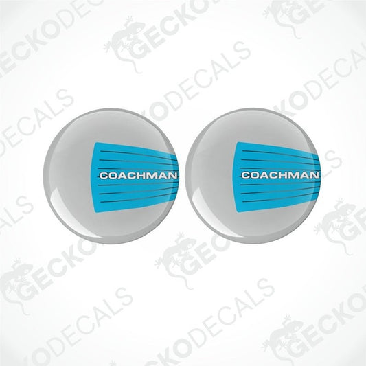 Two round vinyl decals with a blue and white 'COACHMAN' branding, placed on a white background.