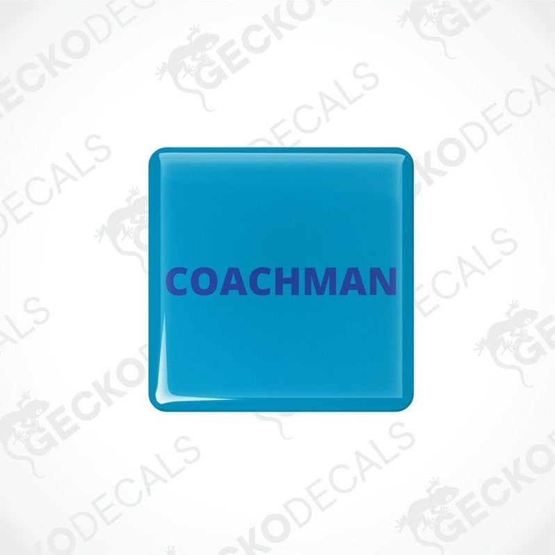 Two blue vinyl stickers with the word 'COACHMAN' 