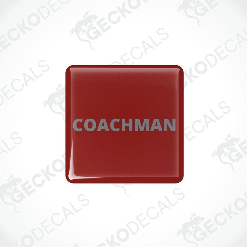 Two red vinyl stickers with the word 'COACHMAN' printed in bold letters, placed against a white background with a Gecko Decals watermark.