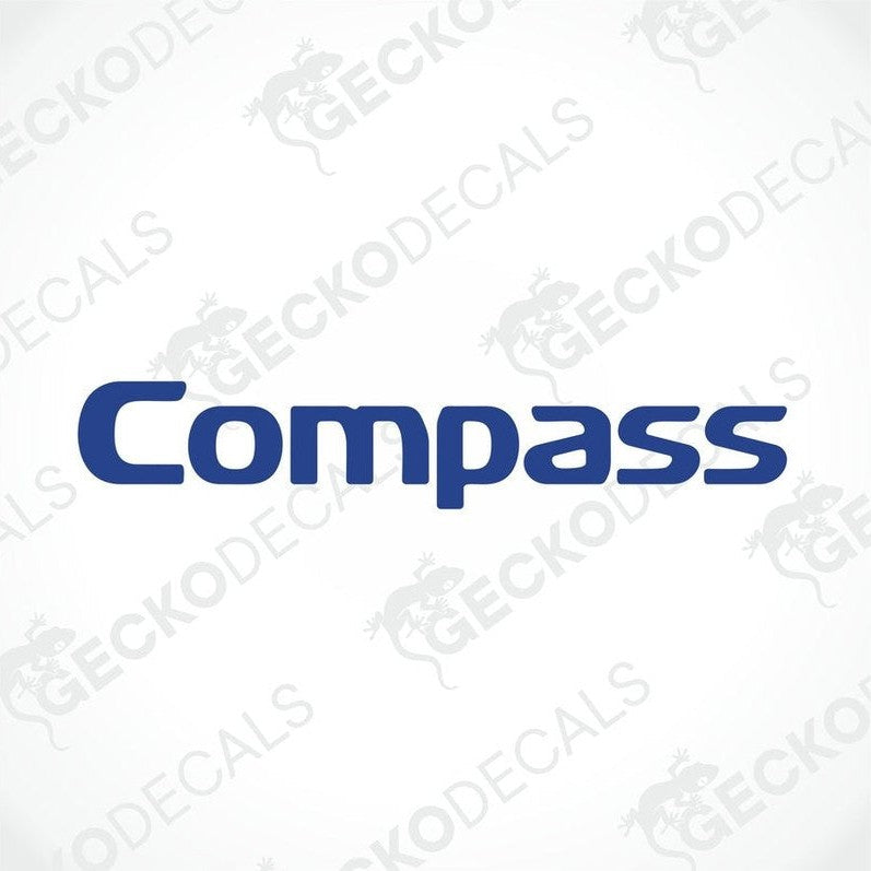 A blue die cut sticker with the word 'COMPASS' displayed on a white background. The sticker has a graphical element resembling a compass needle at the letter 'O'.