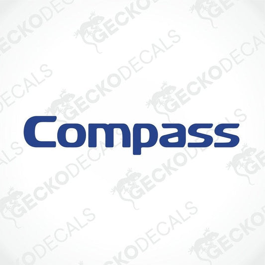 A blue die cut sticker with the word 'COMPASS' displayed on a white background. The sticker has a graphical element resembling a compass needle at the letter 'O'.