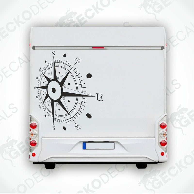A white vehicle decal featuring a black compass design with gecko decals logo at the bottom.