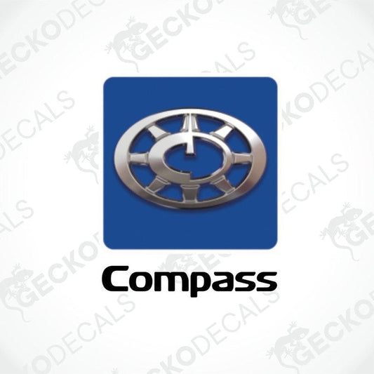 A blue and silver compass-shaped decal with the word 'COMPASS' below it.