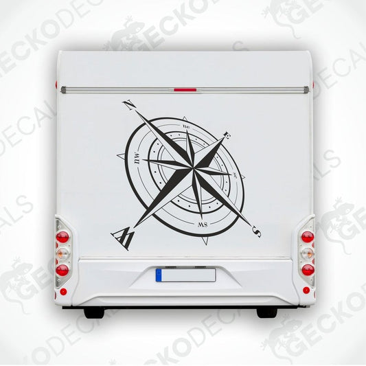 A white vehicle decal featuring a black and white compass design.