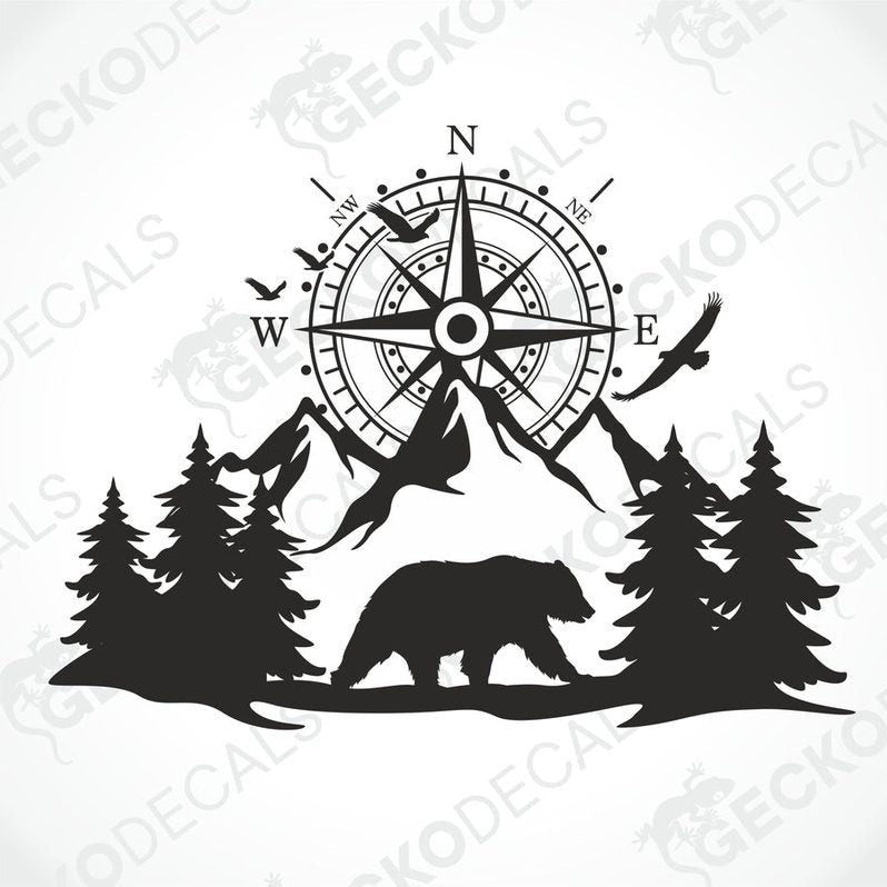 A black decal of a compass with bear and trees on the side of a white vehicle.