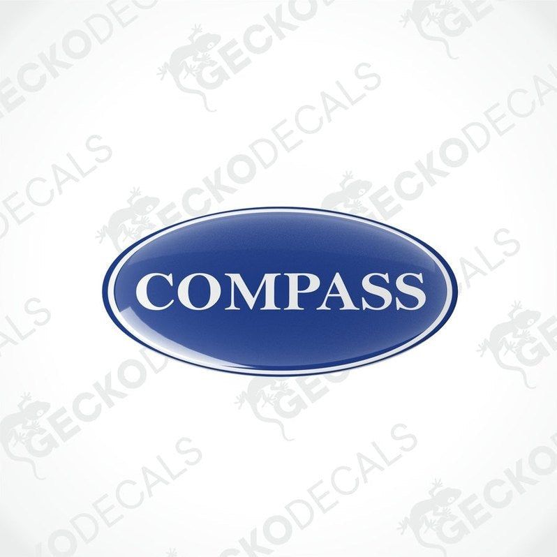 Two blue vinyl stickers with the word 'COMPASS' printed on them.