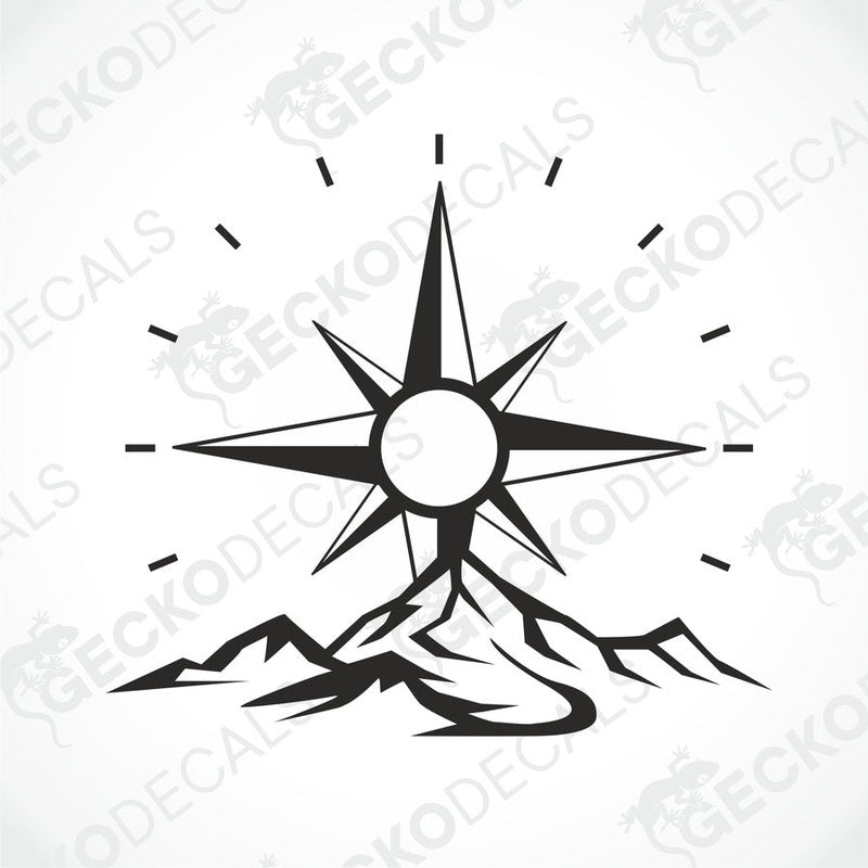 A die cut decal featuring a compass design with mountains, intended for use on a caravan.
